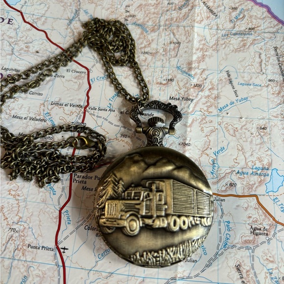 antique style pocket watch with a bronze finish and a truck design on the front - Picture 8 of 11